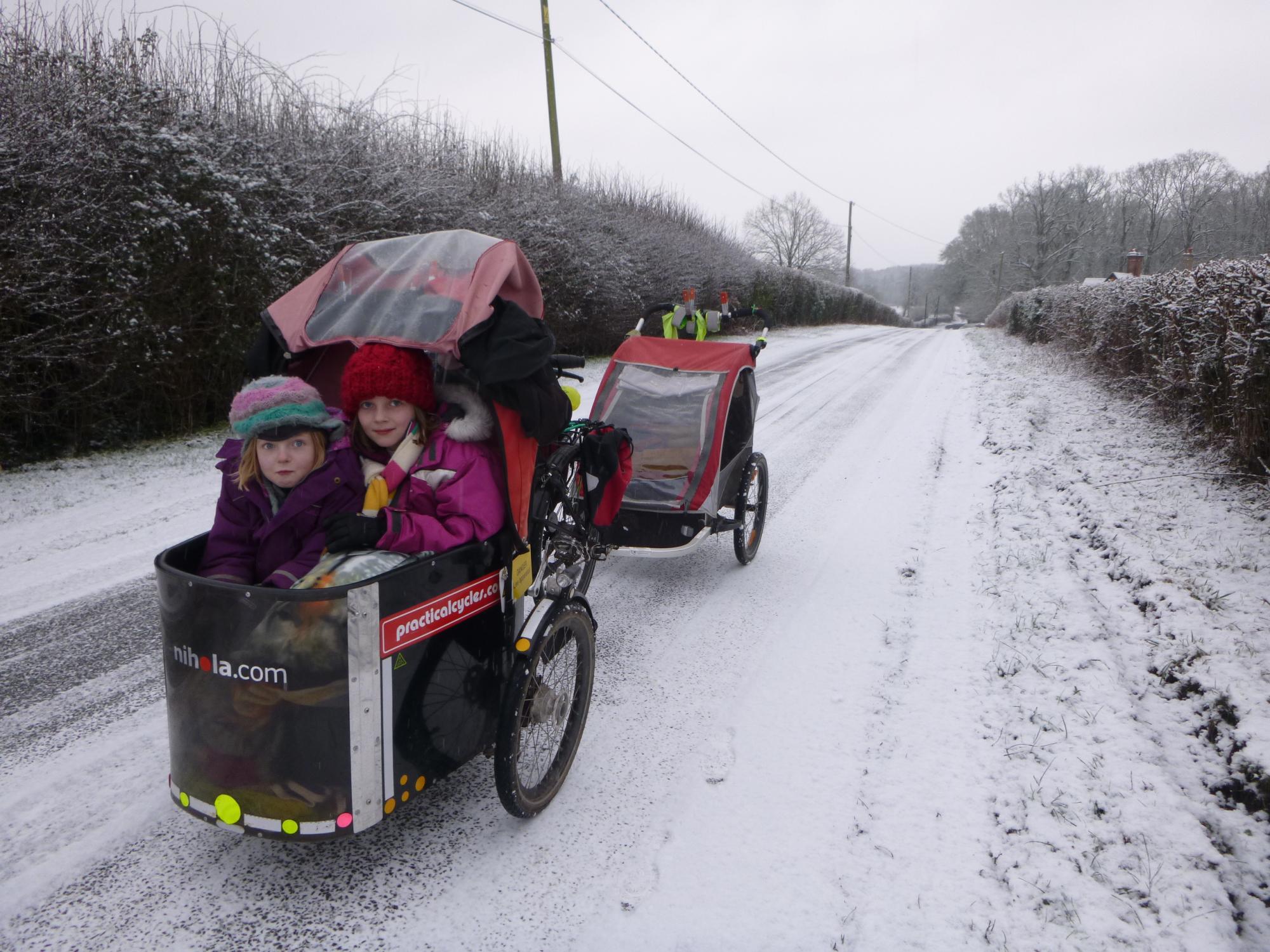 Josie Dew cycling to school in the snow