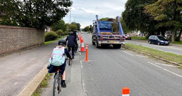 Cyclists in the temporary lane on Upper Shoreham Road