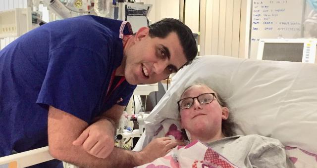 Eve Berry with her father Dave at her hospital bedside