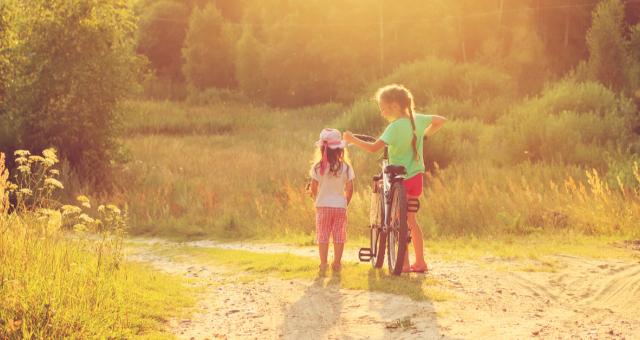 Young children out on a bike ride