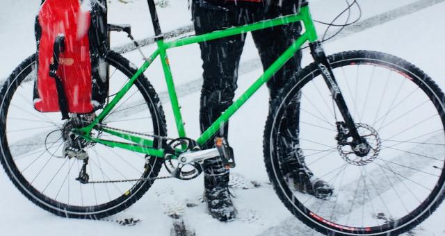 Liz Colebrook cycling in the snow