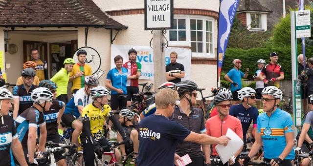 An event organiser and riders.  Photo by Ian Stratton