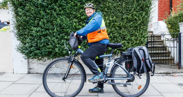 Woman cyclist on her bike