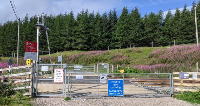 traditional level crossing with locked gates