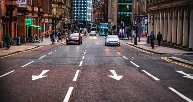 City centre street with multiple lanes of traffic