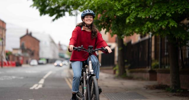 woman riding an e-bike