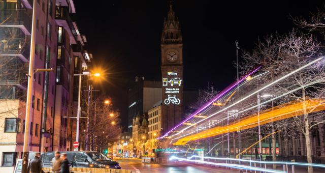 The charity Cycling UK lights up the historic Albert Memorial Clock in Belfast with the pro-cycling message "There is an alternative" on March 31, 2022.