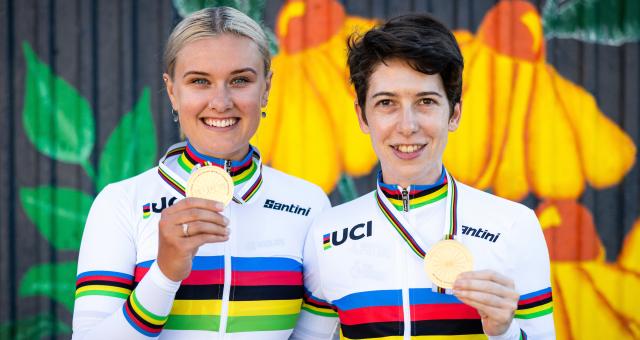 Sophie Unwin (right) and Jenny Holl (left) hold up their medals after winning gold in the Women’s Tandem Trial at the UCI Para-cycling Road World Championships. Credit: SWPix