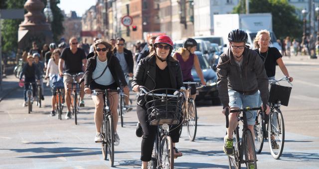 Group of cyclists together on the road in Copenhagen (c) Flickr/Martti Tulenheimo